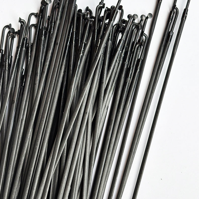 J-bend carbon spoke close-up - 2.8g lightweight | BikeCarbonParts